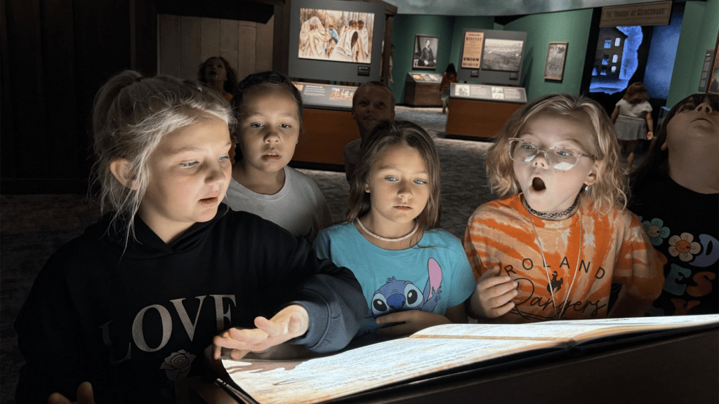 Kids Looking Excitedly at Museum Exhibit